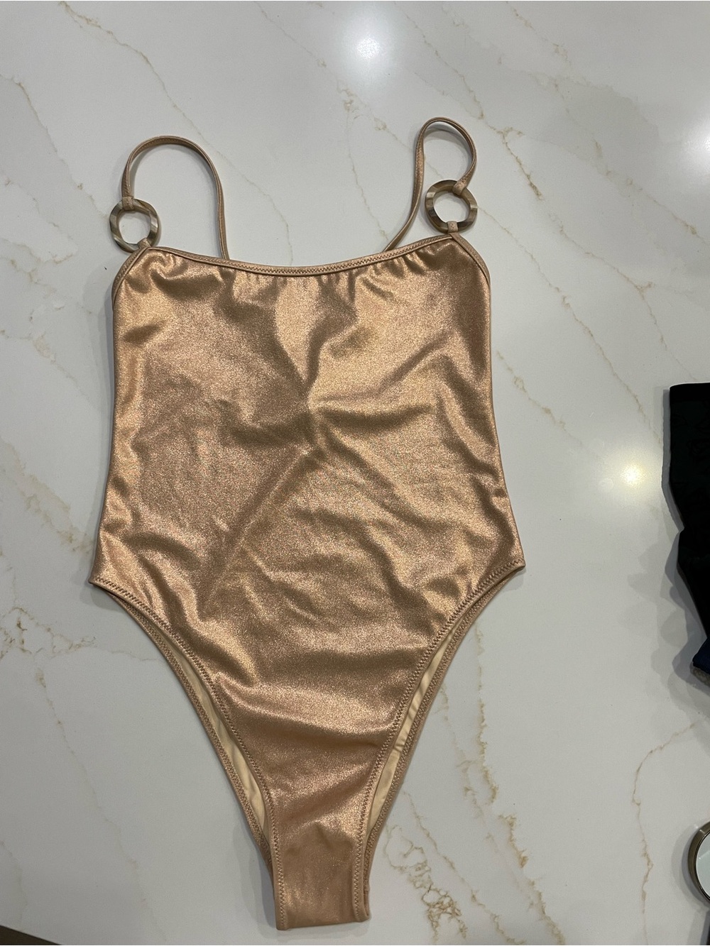 Tropic of C metallic gold, one piece swimsuit.
Victoria’s Secret